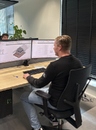 Man sitting behind his computer